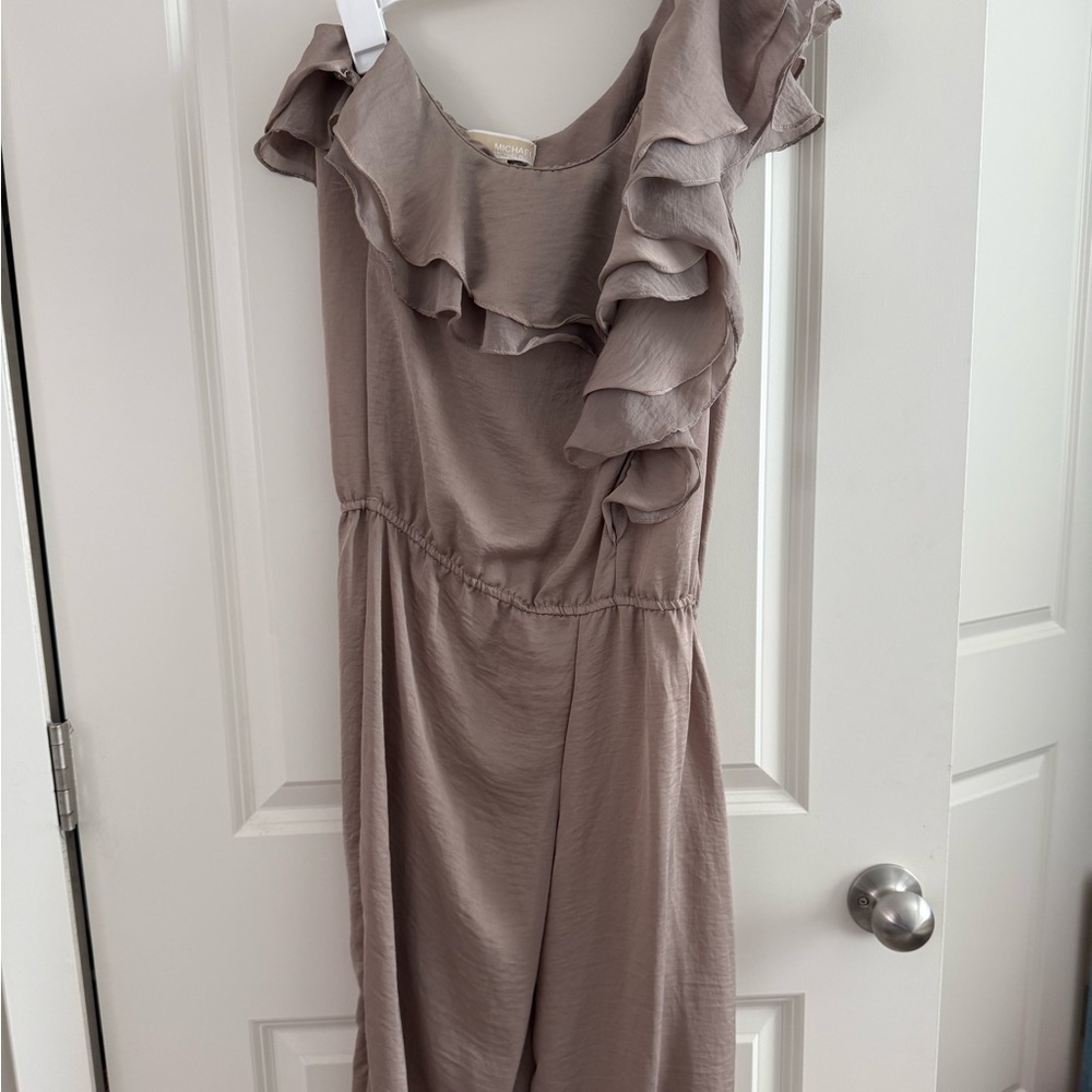 Michael Kors mauve ruffle jumpsuit featuring a one-shoulder design